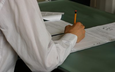 Students writing an exam in a classroom during JoSAA 2026 seat allotment season